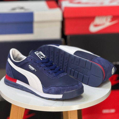 PUMA JOGGER AZUL BLANCA TALON ROJO HOMBRE