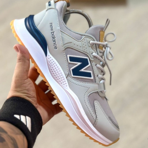 NEW BALANCE GRIS AZUL HOMBRE