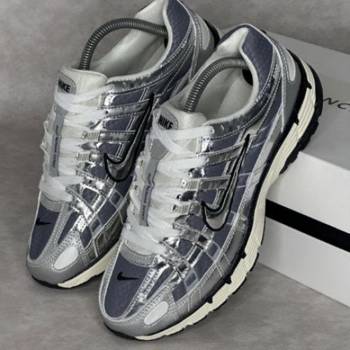 NIKE P6000 GRIS HOMBRE