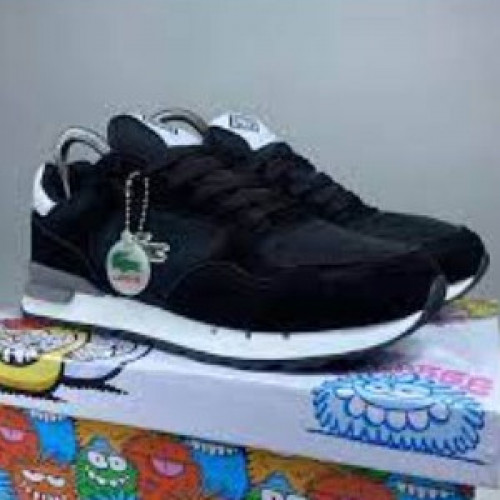 LACOSTE NEGRA BLANCA