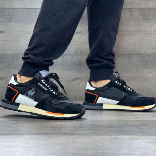 LE COQ SPORTIF NEGRA NARANJA HOMBRE