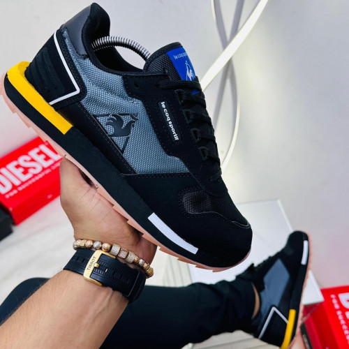 LE COQ SPORTIF NEGRA AMARILLA HOMBRE