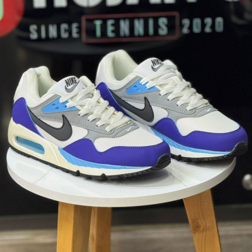 NIKE CORRALETE BLANCA MORADA HOMBRE